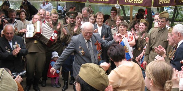 A Russian veteran of World War II dances at a Victory Day celebration in Gorky Park, Moscow (2009).