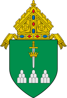 Coat of arms of then Prelature of Lucena Diocese of Lucena Coat of arms Jstor version.svg