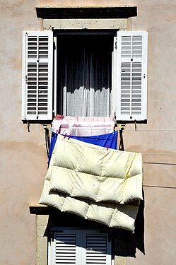 Airing a feather duvet in Dubrovnik, 2010