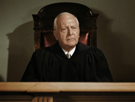 Edward LeSaint in Disorder in the Court (1939).png