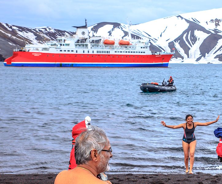 File:Excursion No. 12. into the old caldera of Deception Island.it's absolutely amazing what humans will do for fun.the Polar plunge, witnessed by an array of chicken photographers and a few bewildered (25989828996).jpg