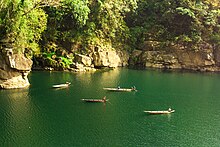 Fishermen at the river Fishermen at Dawki River.jpg