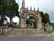 Gateway to churchyard of St Mary, Astbury.jpg