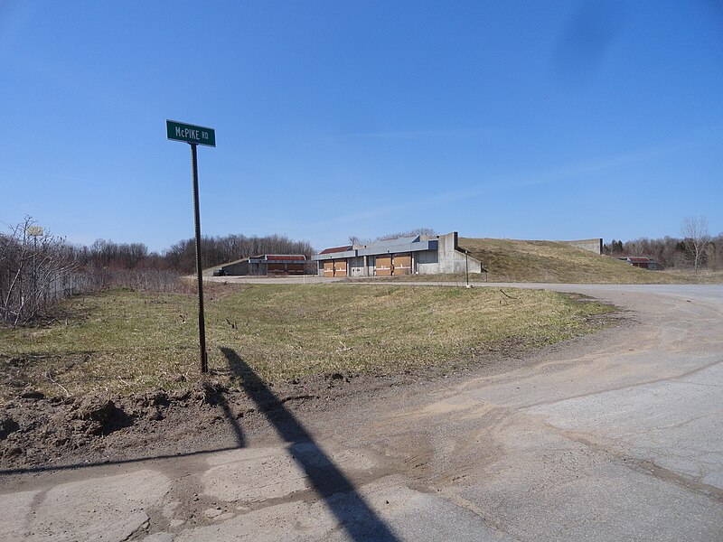 File:Griffiss Weapons Storage Area bunkers behind McPike Road.JPG