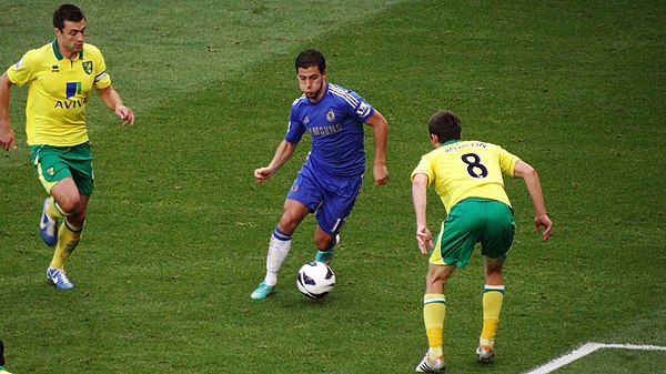 Eden Hazard in possession of the ball during a 2012 match between Chelsea and Norwich City