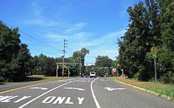 Along westbound Holland Road at CR 52