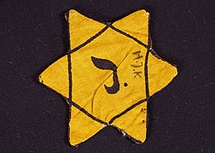 Image 3Yellow badgePhotograph credit: Ronald TorfsYellow badges are badges that Jews were ordered to wear in public during periods of the Middle Ages by the ruling Christians and Muslims, and in Nazi Germany in the 1940s. The badges served to mark the wearer as a religious or ethnic outsider, and often served as a badge of shame. The badge pictured is in the collection of the Kazerne Dossin Memorial, Museum and Documentation Centre in Mechelen, Belgium.More featured pictures