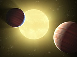 케플러-9를 상상한 천체 예술가의 작품. 그림에는 행성 케플러-9b와 케플러-9c가 보인다.