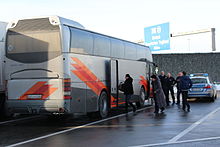 Members of the German Federal Police stop a bus to search it, in an effort to combat drug trafficking. Kontrolle der Bundespolizei.JPG