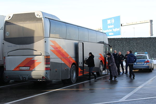 Stop and search on a motorway: BPOL inspecting a bus at a rest stop off Bundesautobahn 9.