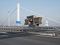 * Nomination Metal sculpture “Brücke und Strom”, Helmuth Gsöllpointner, placed on abutment of Voest Bridge in Linz --Isiwal 07:28, 6 September 2021 (UTC) * Promotion  Support Good quality. --Velvet 07:47, 6 September 2021 (UTC)