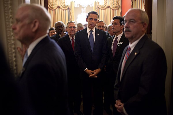 Sergeant at Arms Terrance Gainer (right) escorting President Obama to his 2011 State of the Union Address