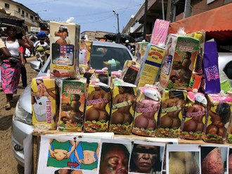 Market stand in Abidjan, Ivory Coast selling buttocks-enlargement syrups for women Market stand in Ivory Coast.png