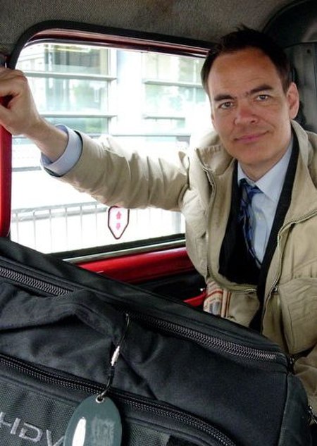 Max keiser in a london taxi.jpg