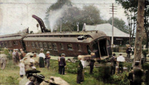 Colorized photograph of the scene; likely taken after June 21, due to a car being removed. Mentor Crash, colorized.png