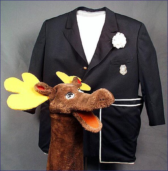 Mr. Moose and the Captain's original navy blue jacket at the Smithsonian Institution
