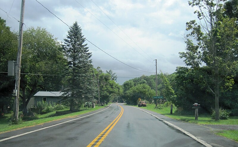 File:NY 315 sb entering Forge Hollow (2), July 2023.jpg