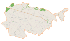 Mapa konturowa gminy Obrazów, u góry nieco na lewo znajduje się punkt z opisem „Komorna”