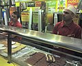 Papaya King hot dogs under counter.jpg