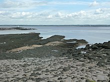 Surviving foundations of the pier Pier foundations, Portskewett.jpg