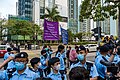 Police raise purple and blue flag outside court 20210301.jpg