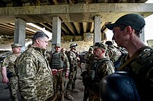 Ukrainian president Petro Poroshenko inspects Ukrainian soldiers positions in the front line in the Donetsk Oblast in June 2016 Poroshenko Donbass-4.jpg