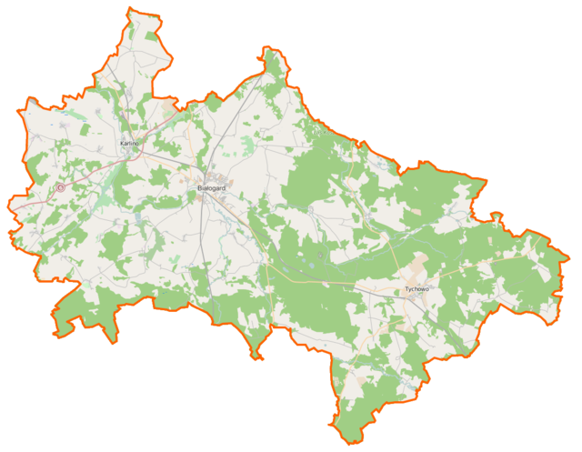 Mapa konturowa powiatu białogardzkiego, po lewej nieco u góry znajduje się punkt z opisem „Karlino”