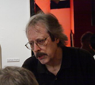 Ron Kolm, poet, novelist, editor Ron Kolm at A Gathering of the Tribes NYC Sep 2011.jpg