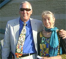 W. Stanley "Sandy" Proctor at the unveiling of the sculpture Double The Fun at the Ludington Public Library Sandy & Melinda Proctor.jpg