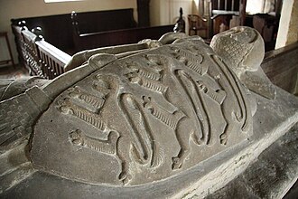 Effigy of Sir William D'Isney in St Peter's parish church. Since 2006, the three lions can be seen flying on the flag at the top of Sleeping Beauty's castle at the beginning of a Disney film. Sir William D'Isney - geograph.org.uk - 1395506.jpg