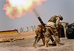 Soldiers firing a M120 120mm mortar (Iraq).jpg