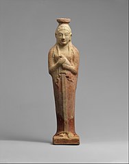 Terracotta alabastron (perfume vase) in the form of a woman holding a dove