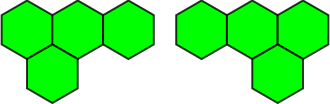 The smallest chiral pair are tetrahexes, like this pair. 3 of 7 are two-sided. Tetrahex-pistols.svg