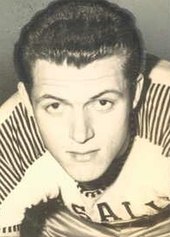 Tom Gola's number 15 is retired by La Salle University. The Tom Gola Arena is named after him. Tom Gola 1953.JPG