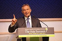 Tony Blair speaking at the WTTC Asia Summit in South Korea in 2013. Tony Blair WTTC Assia Summit South Korea.jpg