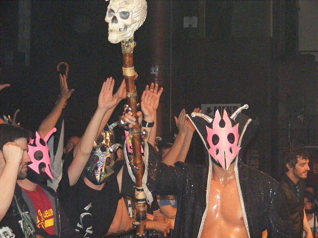 UltraMantis Black holding the staff stolen by Ophidian