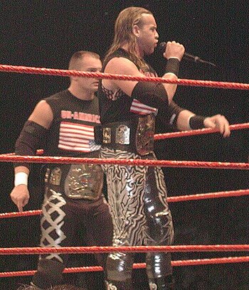 ...and a nine-time WWE Tag Team Champion (shown here alongside Lance Storm, with whom he won his eighth title).