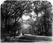 Two people in the Tiergarten, 1866. Vogel, Hermann Wilhelm - >>Abend<<, aus der Mappe >>Bilder aus dem Tiergarten<<, Berlin (Zeno Fotografie).jpg