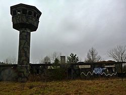 Former watchtower and building