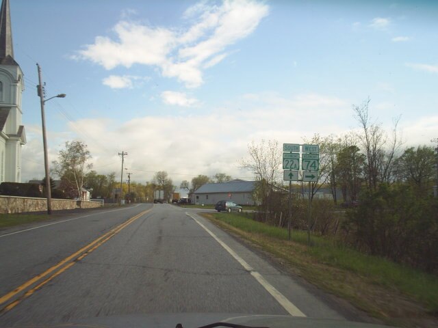 Signs at the southern end of VT 74's concurrency with VT 22A