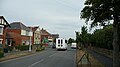 English: Wightbus 5881 (KE04 EAG), a Mercedes-Benz Sprinter/UVG, in Worsley Road, Gurnard, Isle of Wight, on route 32. It has just passed the junction with The Avenue.