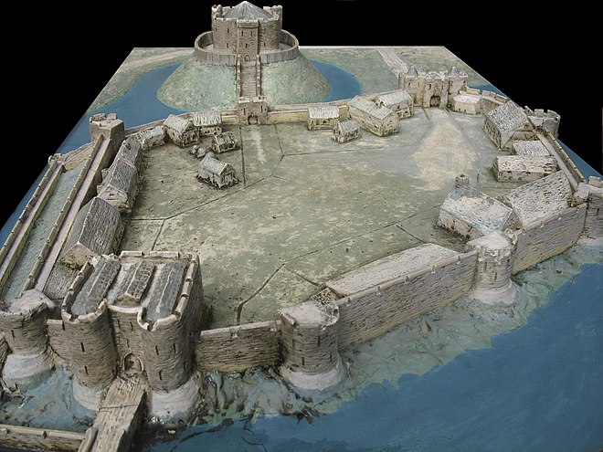 A reconstruction of York Castle in the 14th century, showing the castle's stone keep (top) overlooking the castle bailey (below)