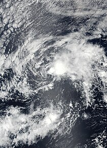 Imagem de satélite da depressão tropical One-E várias horas depois de ser classificada como um ciclone tropical em 10 de maio