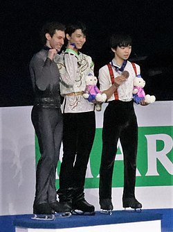 Kagiyama (right) with Jason Brown (left) and Yuzuru Hanyu (center) on the 2020 Four Continents Championships podium