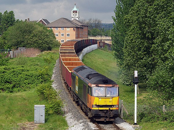 Freight train passing over the "Ski Jump" bridge