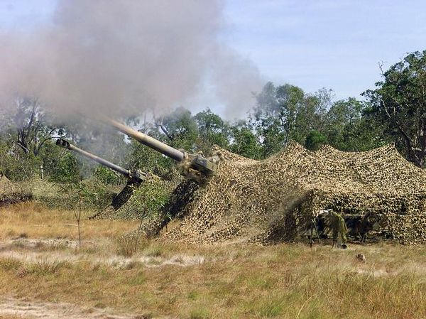 Australian M198s firing during an exercise