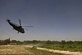 A SH-3H Sea King helicopter takes off from Patrol Base Jaker in Nawa district, Helmand province, Afghanistan, Aug. 21, 2009 090821-M-ZU432-010.jpg