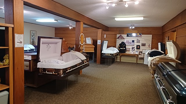 A casket showroom in Billings, Montana, depicting split lid coffins.