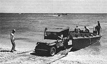 A jeep comes ashore over Sommerfeld track in a training exercise at Camp Edwards A jeep comes ashore over Sommerfeld track in a training exercise at Camp Edwards.jpg