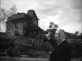 Alfred Hitchcock showing Norman Bates' house, in Psycho's trailer